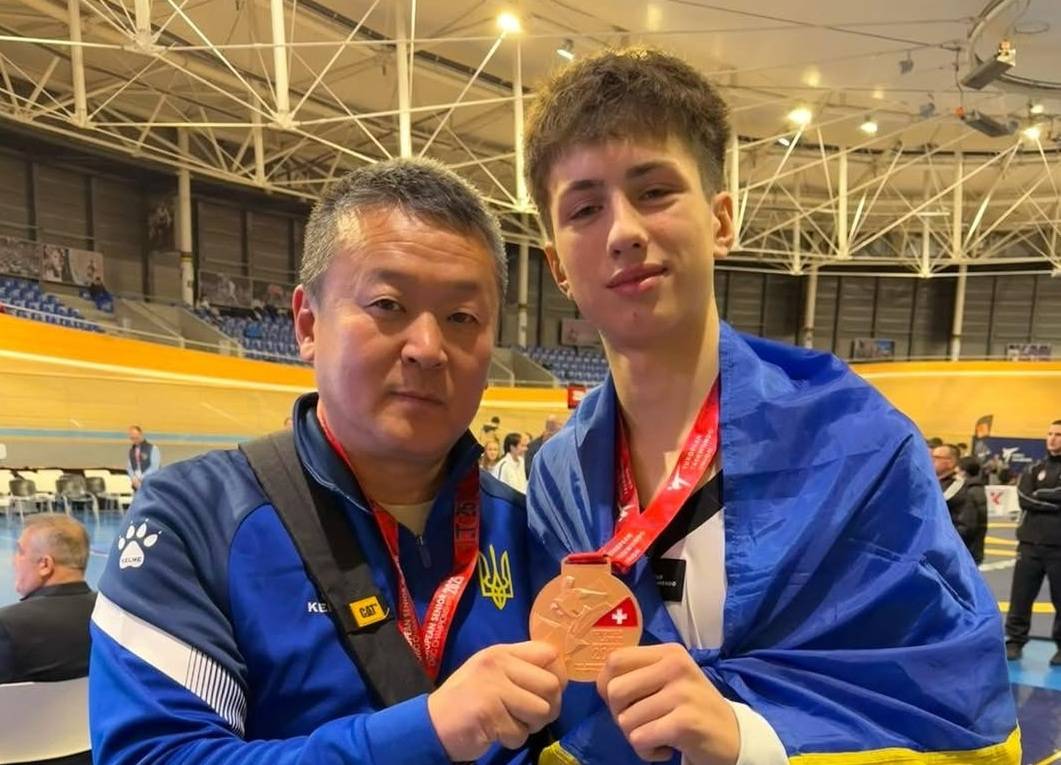 Артьом Кузнєцов з тренером