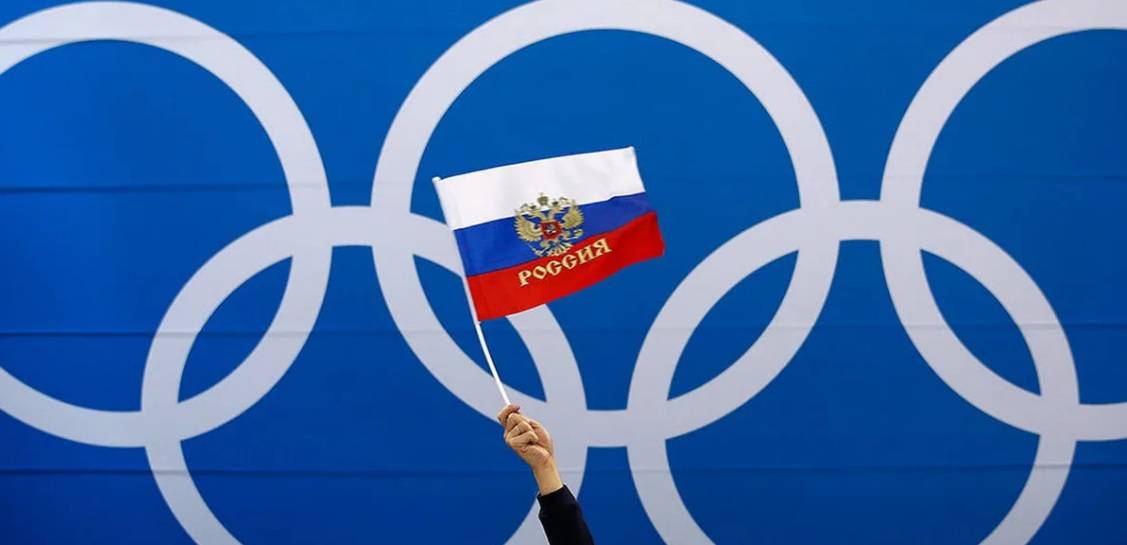 росія